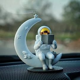 Street27® Astronaut Figurine Showpiece for Home Décor Idols for Office Desk Table Astronaut Toy for Car Dashboard, Statue for Gift Gifting Items Birthday Decoration (Reading on Moon - Golden)